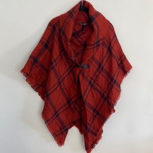Never worn burnt orange with navy blue plaid striping one-size-fits all poncho